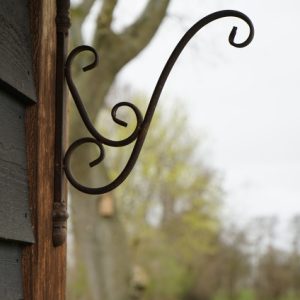 Metalen wandhaak roest β sierlijk